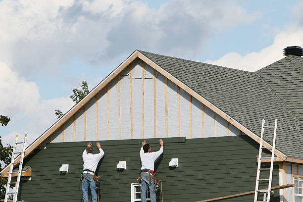 Professional Vinyl Siding technician working in Fort Loramie, OH